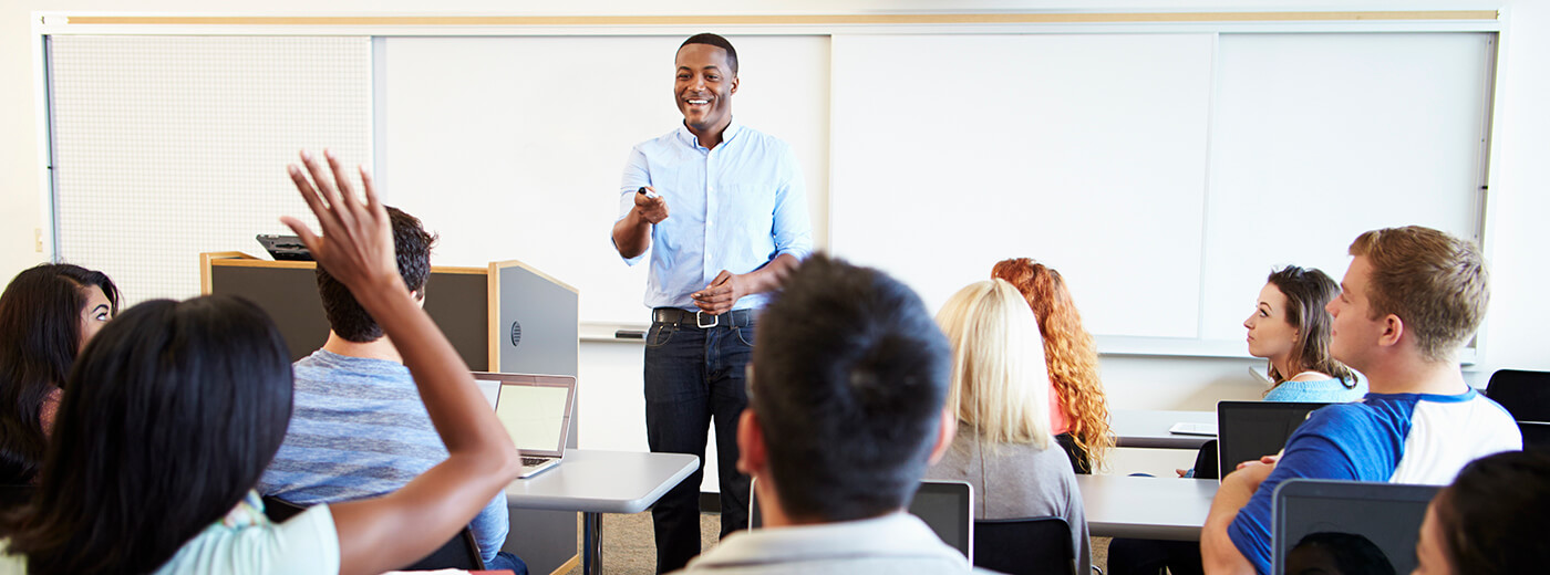 Teacher with students participating in class discussion