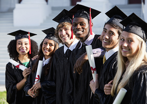 photo of a group of college graduates in cap and gown