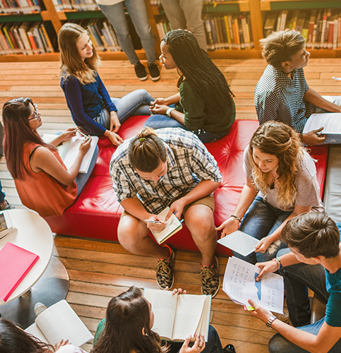 a group of students in school library studying
