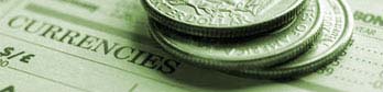 image of quarters on a newspaper